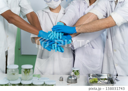 group of biochemical scientists are joining forces group of biochemical scientists are joining forces 138031743