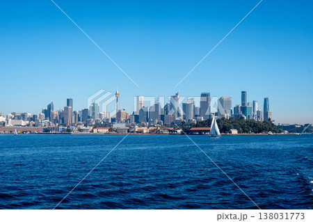 Sydney skyline view with skyscrapers and blue sky from the water Sydney skyline view with skyscrapers and blue sky from the water 138031773