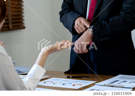 Manager showing dissatisfaction with subordinates late Manager showing dissatisfaction with subordinates late 138031904