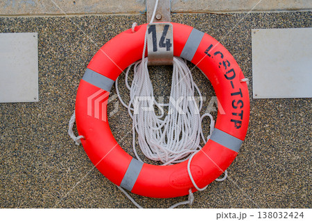 safety life buoy on harbour pier safety life buoy on harbour pier 138032424