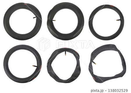 Collection of bicycle inner tubes isolated on white background. Collection of bicycle inner tubes isolated on white background. 138032529