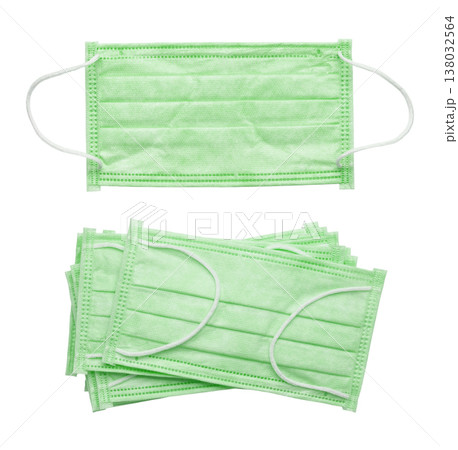 Set of blue medical masks isolated on white background. Set of blue medical masks isolated on white background. 138032564