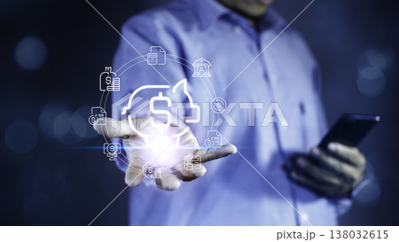 Save money concept with digital piggy bank and financial icons floating above human hand 138032615