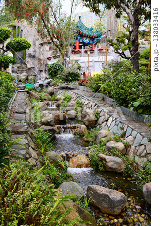 Water stream in gardens of the Wong Tai Sin Temple, Hong Kong Water stream in gardens of the Wong Tai Sin Temple, Hong Kong 138033416