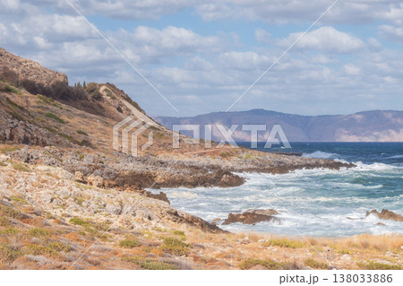 Cretan seascape in windy weather with strong surf and white foam on the sea. 138033886