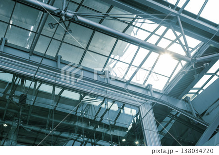 Modern building roofing structure. Glass roof metal frame construction with complex Engineering 138034720