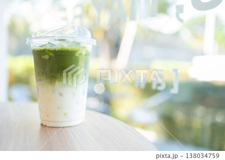 Closeup Iced Milk Latte Green Tea, Delight fresh healthy beverage drinks served on the table 138034759