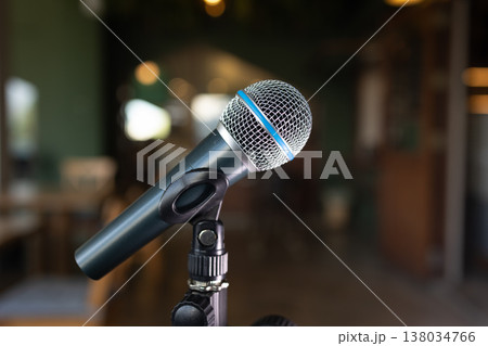 Closeup Microphone is on the stage indoor restaurant cafe for artist sing a song music entertainment Closeup Microphone is on the stage indoor restaurant cafe for artist sing a song music entertainment 138034766