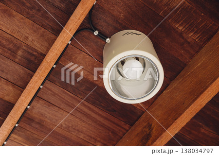 Ceiling lamp, Downlight mounted at wooden ceiling roof at home interior electricity modern design. Ceiling lamp, Downlight mounted at wooden ceiling roof at home interior electricity modern design. 138034797