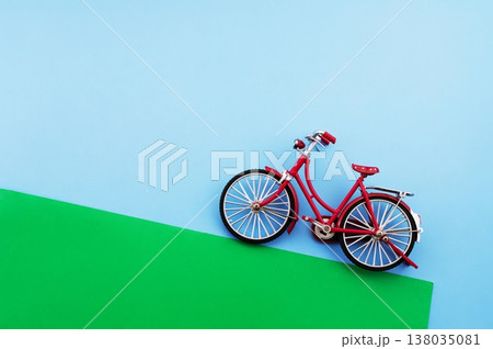 World Bicycle Day. Bicycle isolated on sky blue background. Copy space. Environment preserve. World Bicycle Day. Bicycle isolated on sky blue background. Copy space. Environment preserve. 138035081