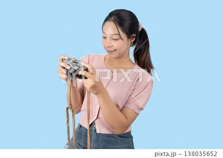 young teen happy smile enjoy photo hobby, girl model with vintage film camera studio shot isolated 138035652