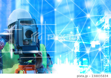 Surveying construction site. The surveyor, Geodesy modern technologies. Electronic tacheometer. Geodetic instrument. Equipment for topographer. Total station near construction cranes. Geodetic device 138035834