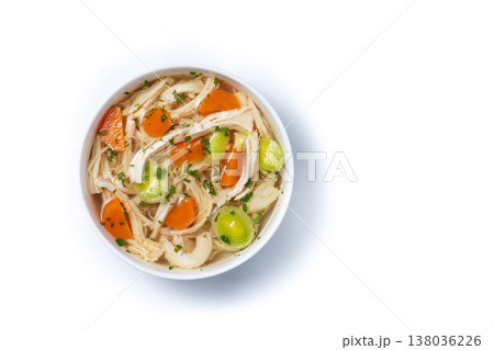 Homemade chicken soup in white bowl with carrots and celery Homemade chicken soup in white bowl with carrots and celery 138036226