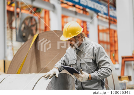 Senior staff worker in heavy industry, healthy elderly supervisor man work in metal sheet factory 138036342
