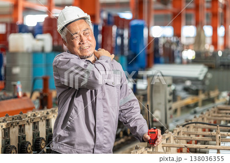 Senior worker tired exhausted muscle pain, Suffering shoulder pain from hard work in heavy industry 138036355