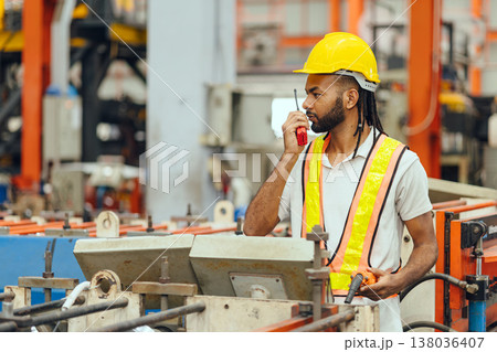 Professional African black worker working machine operator in heavy industry factory supervisor Professional African black worker working machine operator in heavy industry factory supervisor 138036407