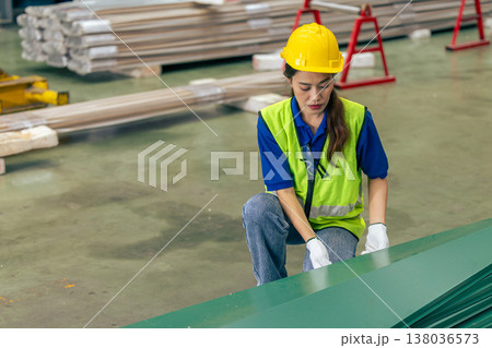 Asian woman engineer worker, professional employee working in metal sheet plant factory Asian woman engineer worker, professional employee working in metal sheet plant factory 138036573