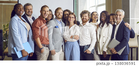 Portrait of diverse business people standing on a meeting and looking at the camera. Portrait of diverse business people standing on a meeting and looking at the camera. 138036591