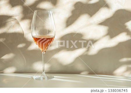 Rose Wine Glasses under Sunlight. Elegant Spring Still Life Rose Wine Glasses under Sunlight. Elegant Spring Still Life 138036745