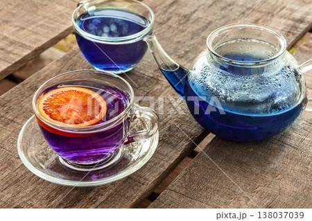 Blue and purple tea, an infusion of butterfly pea flowers, with a citrus Blue and purple tea, an infusion of butterfly pea flowers, with a citrus 138037039