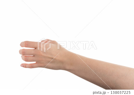 Young woman hand hold something isolated on white background Young woman hand hold something isolated on white background 138037225