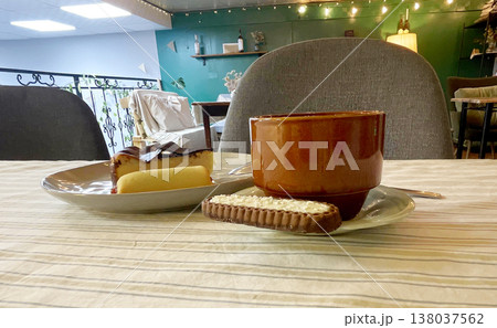 coffee with sweets on the table in a cafe 138037562