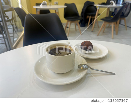 coffee and sweets on the table in a cafe 138037567