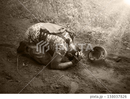 Sad soldier cry on the ground 138037826