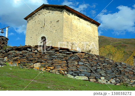 The old Orthodox church of Lamaria and its bell in the village of Ushguli, Georgia. 138038272
