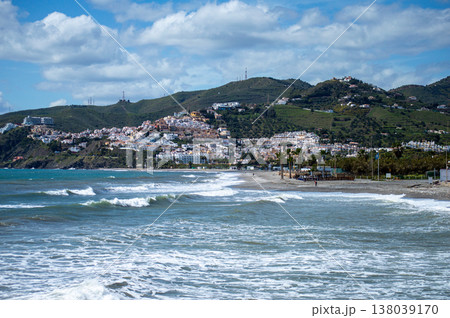 Wonderful landscapes of the shimmering sea and charming city unfold, offering breathtaking coastal views and a picturesque atmosphere in Nerja, Spain 138039170