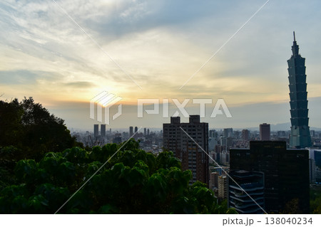 Aerial view of skyline of Taipei city with Taipei 101 Skyscraper at sunset from Xiangshan Elephant Mountain. Beautiful landscape and cityscape of Taipei downtown buildings and architecture in the city Aerial view of skyline of Taipei city with Taipei 101 Skyscraper at sunset from Xiangshan Elephant Mountain. Beautiful landscape and cityscape of Taipei downtown buildings and architecture in the city 138040234