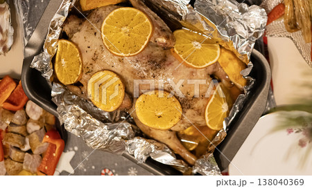 Roasted whole duck served with orange slices. Christmas dish Roasted whole duck served with orange slices. Christmas dish 138040369