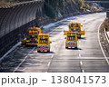 冬季の高速道路を走行する除雪車隊列/道路維持作業の様子V2 冬季の高速道路を走行する除雪車隊列/道路維持作業の様子V2 138041573