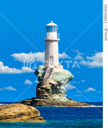 The beautiful Lighthouse Tourlitis of Chora at night. Andros island, Cyclades, Greece 138041603