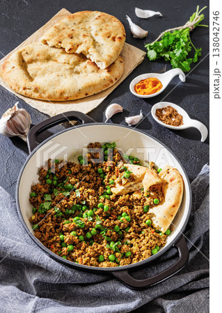 Indian keema matar with minced meat, peas and naan Indian keema matar with minced meat, peas and naan 138042746