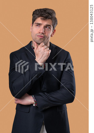 Thinking Businessman Looking Up, Searching Opportunity On Beige Background 138043125