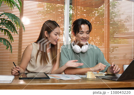 A young Asian couple spend time together at home A young Asian couple spend time together at home 138043220