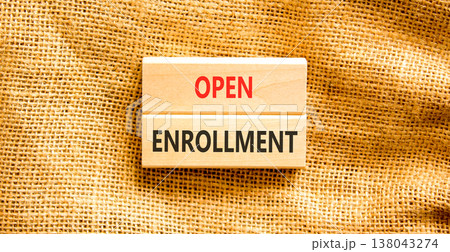 Open enrollment words symbol. Concept words Open enrollment on beautiful wooden blocks. Beautiful canvas background. Medical and Open enrollment words concept. Copy space. 138043274