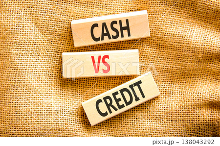 Cash vs credit words symbol. Concept words Cash vs credit on beautiful wooden blocks. Beautiful canvas background. Business and cash vs credit concept. Copy space. 138043292