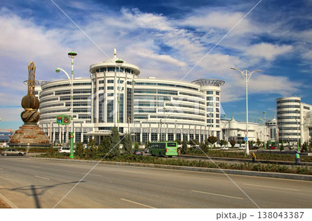 Ashgabat, Turkmenistan - October 20, 2023: View of the Sport Hotel and the art monument. Ashgabat, Turkmenistan - October 20, 2023: View of the Sport Hotel and the art monument. 138043387