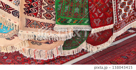 Pavilion selling Turkmen handmade carpets. Handmade carpets with traditional ornament. Turkmenistan. Ashkhabad market. Pavilion selling Turkmen handmade carpets. Handmade carpets with traditional ornament. Turkmenistan. Ashkhabad market. 138043415