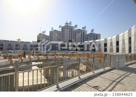 Ashgabat, Turkmenistan. September 21, 2021. Modern architecture of Ashgabat. New shopping mall "Ashgabat" . Ashgabat, Turkmenistan. September 21, 2021. Modern architecture of Ashgabat. New shopping mall "Ashgabat" . 138044625