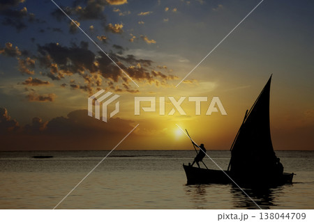 sailboat at sunset in Mauritius island sailboat at sunset in Mauritius island 138044709