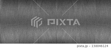 texture of thread for a sewing machine gray colors on a white background texture of thread for a sewing machine gray colors on a white background 138046124