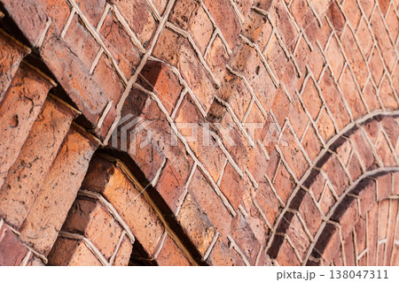 Close-up of a weathered red brick wall, abstract photo Close-up of a weathered red brick wall, abstract photo 138047311