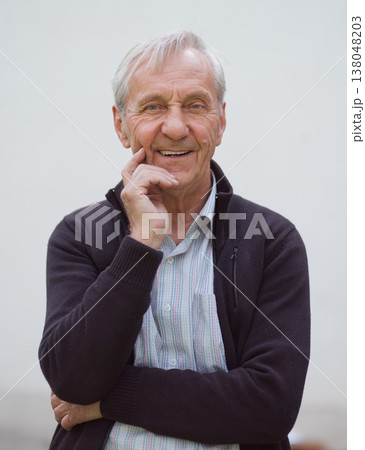 Smiling grandfather portrait representing family, three generations and warm senior connection in casual wear 138048203