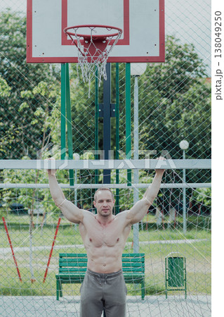 A CrossFit man poses for the camera on a sports 138049250
