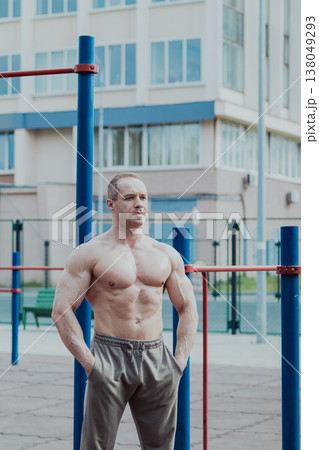 A CrossFit man poses for the camera on a sports 138049293