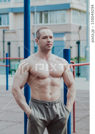 A CrossFit man poses for the camera on a sports 138049294