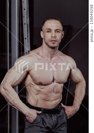 Bodybuilder posing in the gym, aesthetic body Bodybuilder posing in the gym, aesthetic body 138049298